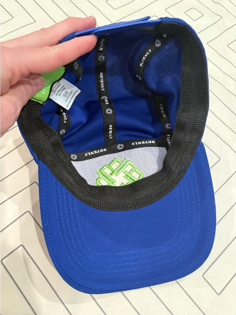 Betenly Blue Athletic Cap with Neon Green Knot Logo